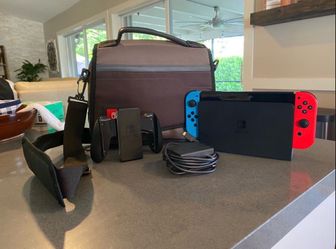 Nintendo Switch with Accessories and Carry Case
