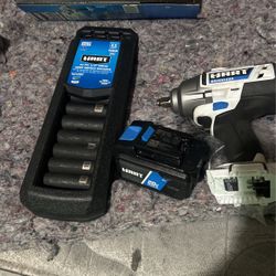 Impact Wrench With Sockets