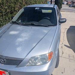 2001 Mazda Protege – Runs Great – Subwoofer & Amp – $1200