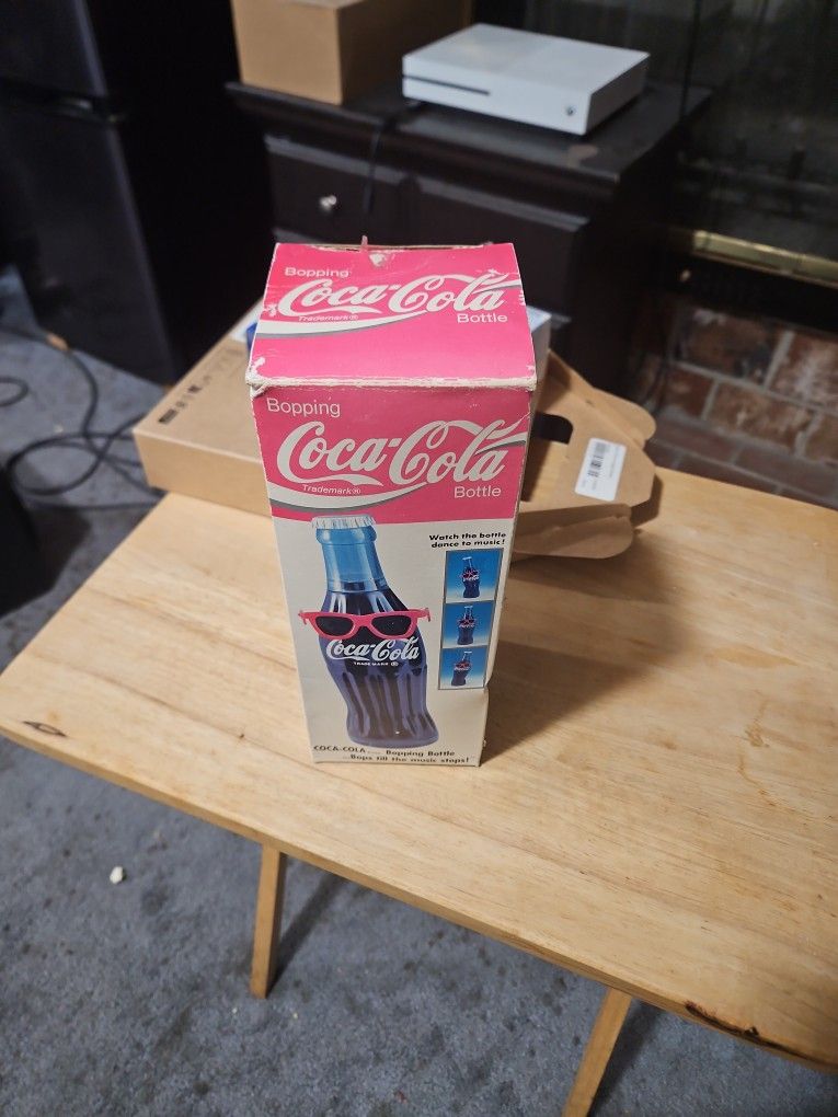 Dancing Coca Cola Bottle