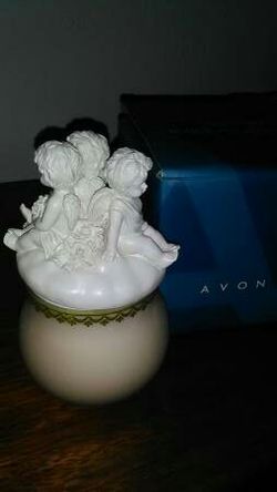 Avon collectible cherub candle* brand new*