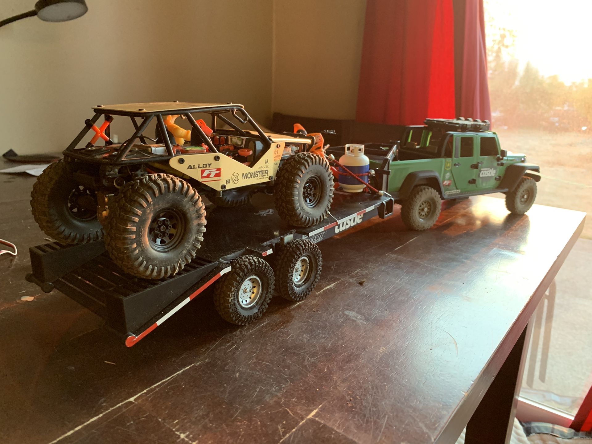 Gladiator rc car with gooseneck trailer and rc buggy.