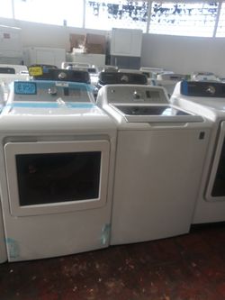 NEW scratch and dent GE top load washer and dryer set