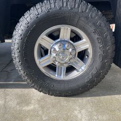 Ram LARAMIE 17” Chrome Wheels / TOYO OPEN COUNTRY AT LT285/75R17 TIRES