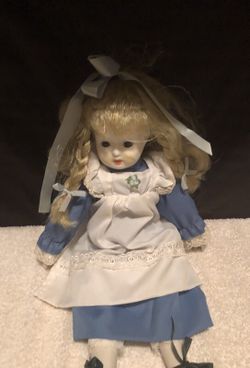 Very nice porcelain doll 16 inch