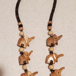 WOODEN  TAN  BEEDS  WITH  6  ELEPHANT  CHARMS NECKLACE  APROX  13"INCHES  LONG  IN GOOD  CONDITION  