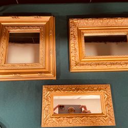 Vintage set of 3 ornate gold guilded mirrors in various shapes