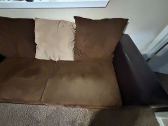 Brown love seat couch