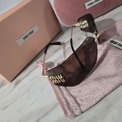 Miu Miu  Sunglasses 