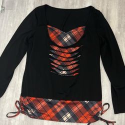 Long sleeve red and black plaid pattern ruched drawstring funnel neck shirt.