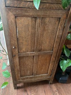 Antique plant stand with storage