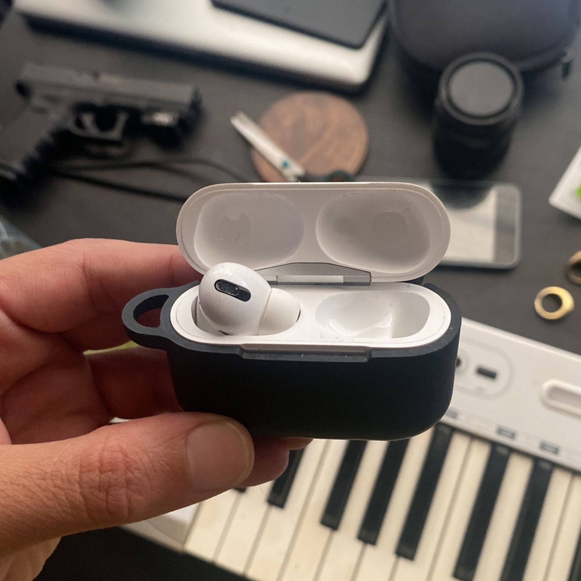 One Air Pod Pros With Charger Case