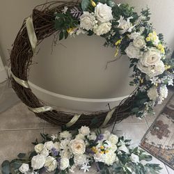 Large Wreath And Additional Flower Arrangement