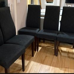 Six black chairs