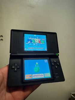 Ds lite with original charger and games