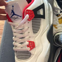 Nike Jordan’s blue, red and white shoes