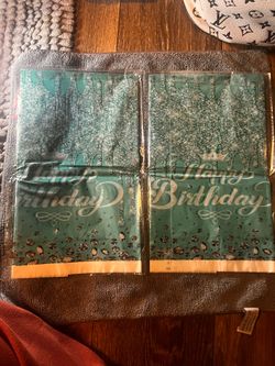Teal Happy Birthday table liners.
