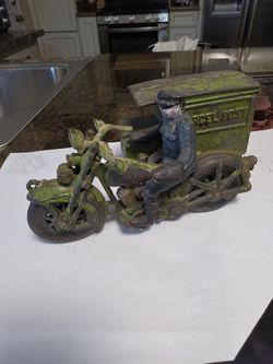 Old cast iron toy, Harley Davison parcel post.