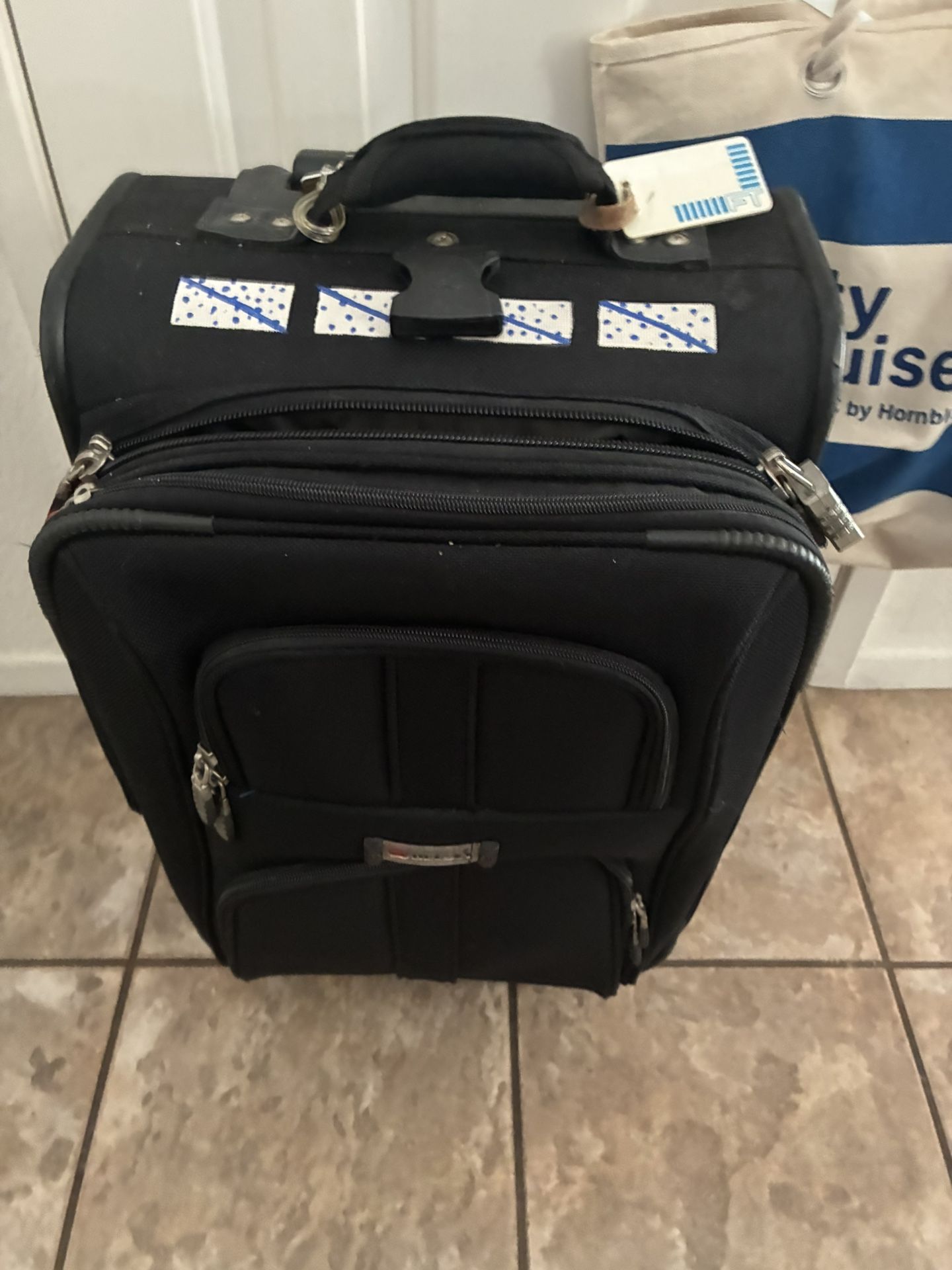 Delsey Luggage Rolling Overhead And An Overnight Bag 