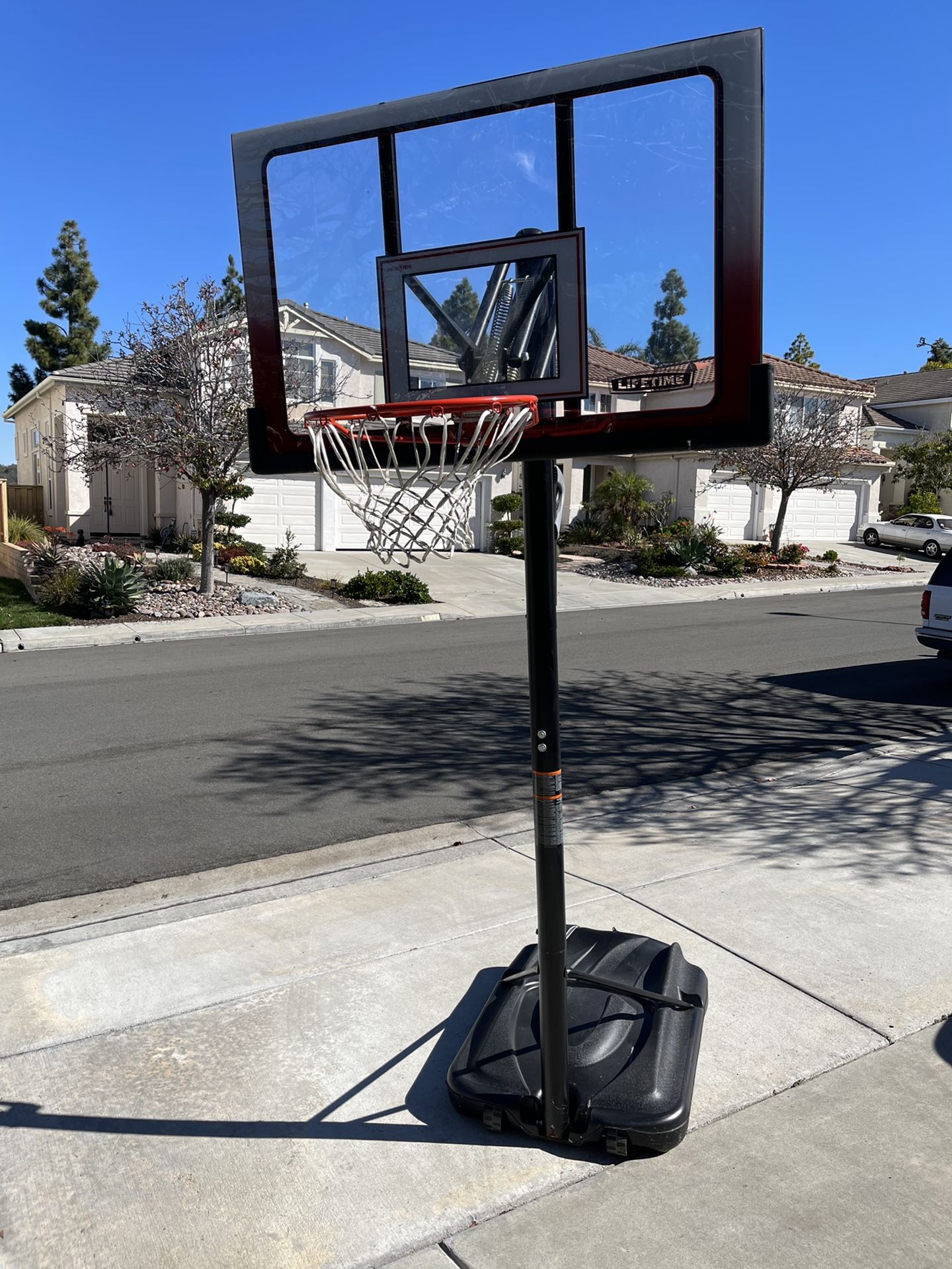 LIFETIME ADJUSTABLE PORTABLE BASKETBALL HOOP (52-INCH POLYCARBONATE) Model 1558