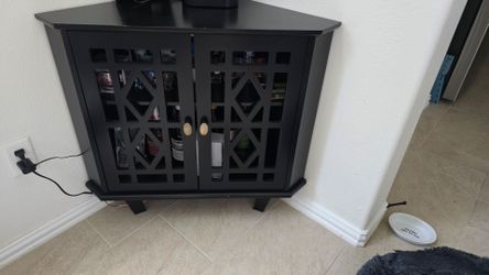 Corner liquor cabinet