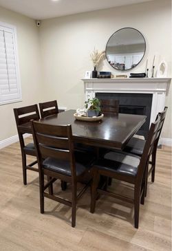 Dining table with storage under