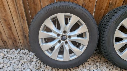 4 225/55 R18 Blizzak tires on Subaru wheels