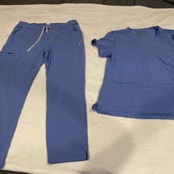 Figs scrubs top and bottom, size M $25