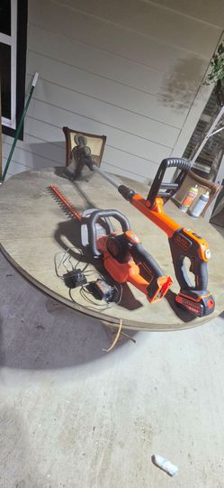 Trimmer and hedge trimmer