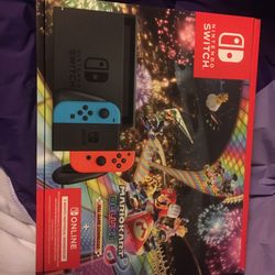 New Nintendo Switch™ w/ Neon Blue & Neon Red Joy-Con™ + Mario Kart™ 8 Deluxe (Full Game Download) + 3 Month Nintendo Switch Online Individual Membersh