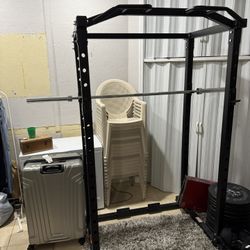 Squat Rack Barbell Weight Plates Dumbbells Pull-up Bar