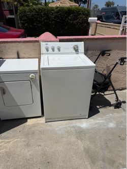Washer. Dryer. Refridgator freezer