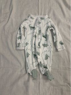 Newborn boy Carter’s white Dino pajamas