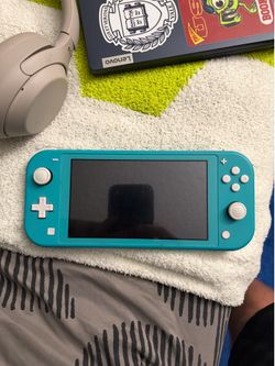 Blue Nintendo Switch Lite with Pokemon Legends Arceus
