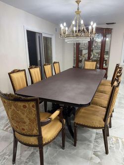 Traditional Extendable Wood Dining Table with Decorative Inlay and 10 Upholstered Chairs