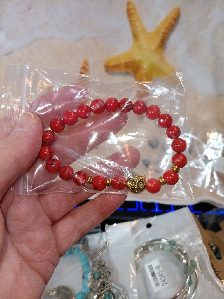 Red Beaded Bracelet With 🦉 As A Charm