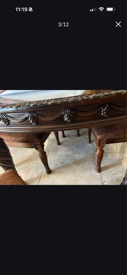Like New Dining Table Set With Extra leaf (Table And 6 Chairs )from Ashley Furniture
