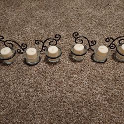 Two decorative candle holders