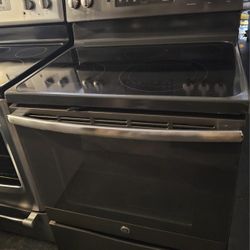 GE SLATE COLOR FRENCH DOOR REFRIGERATOR AND GLASSTOP STOVE....$ $ 800