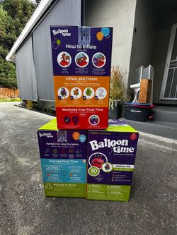 Three small balloon time helium tanks