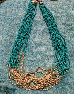 Turquoise and gold beaded necklace