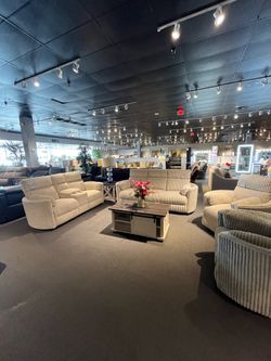 Ivory Corduroy Power Reclining Sofa and Loveseat