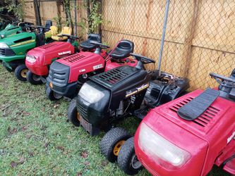 Riding lawn mower / tractor parts decks motors hoods wheels and tires located in Highlands Texas also by non-running riding mowers and tractors