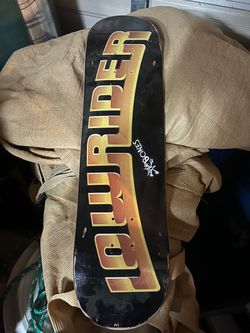Lowrider Skateboard Deck with Bones Sticker