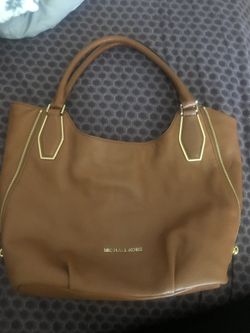 Michael Kors purse price is firm