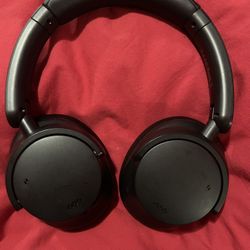 Two pair headphones. One noise canceling 