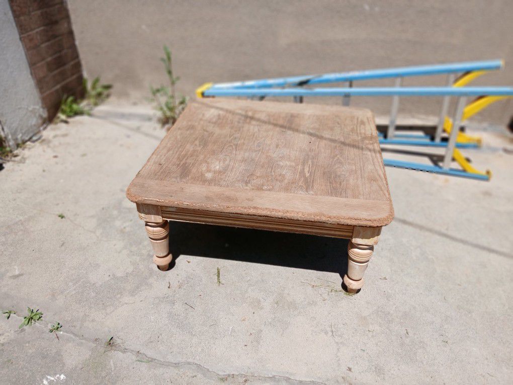 Heavy quality wood table low to ground