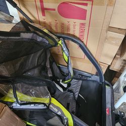 Bike trailer with cover and seatbelts very good condition