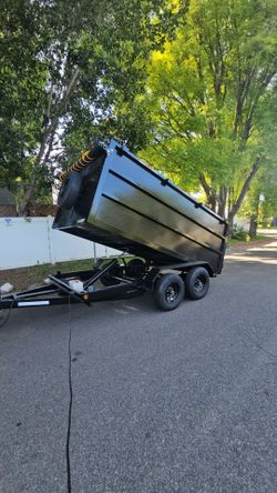 BRAND NEW DESIGN DUMP TRAILER 12x8x4 12,000 LBS ROLLING TARP AND SPARE TIRE HYDRAULIC SYSTEM ELECTRIC BRAKES TITLE IN HAND FOR ANY QUESTION TEXT ME PL