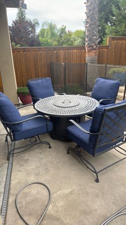 4 Rocker chairs with navy cushions